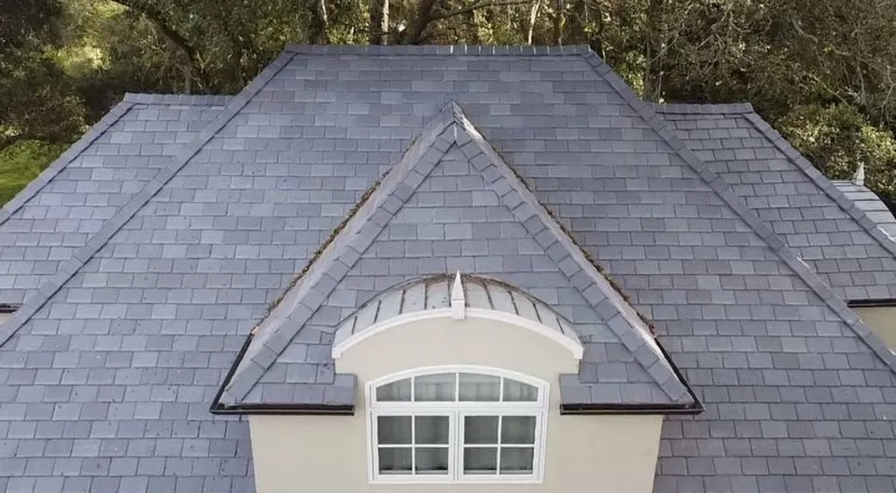 Slide of Exclusively Roofing