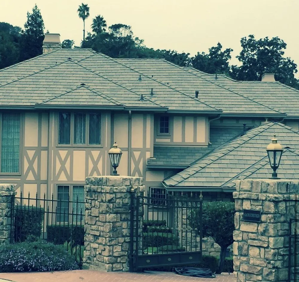 Slide of Exclusively Roofing