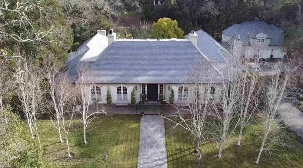 Slide of Exclusively Roofing