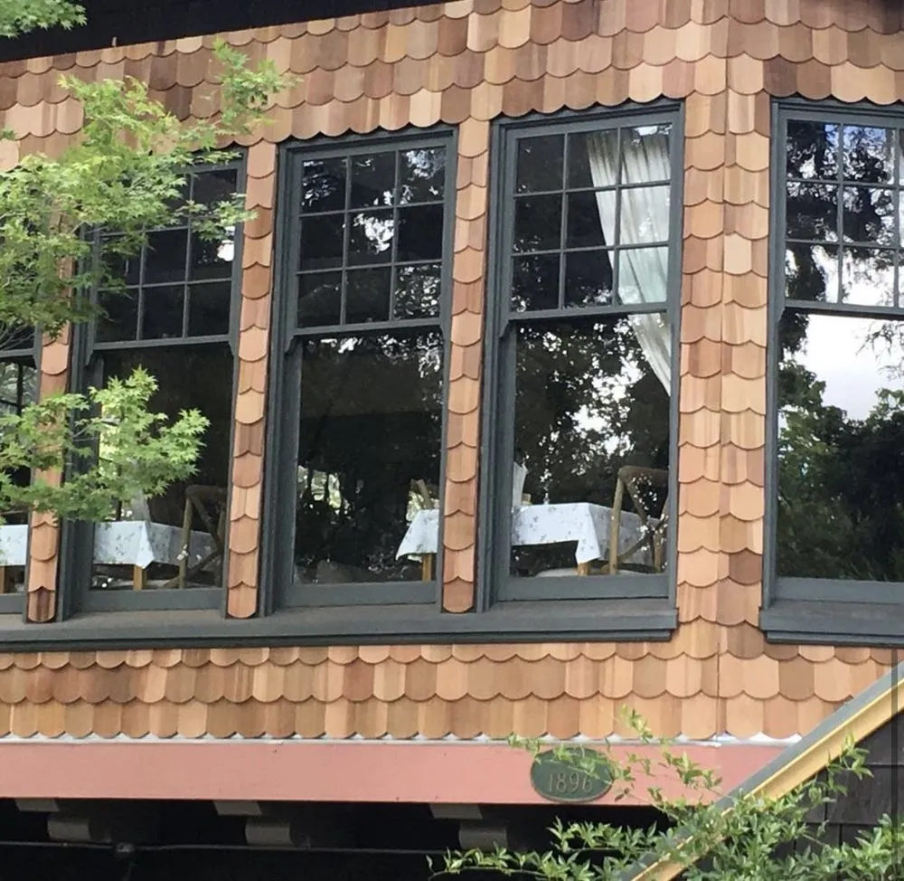 Slide of Exclusively Roofing