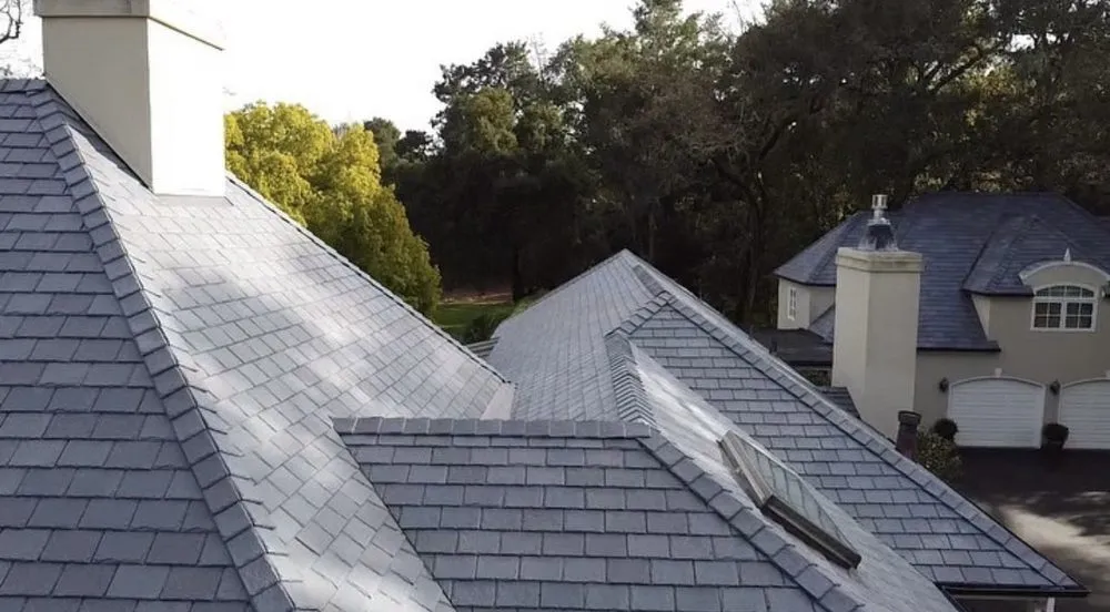 Slide of Exclusively Roofing