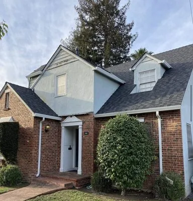 Exclusively Roofing Logo