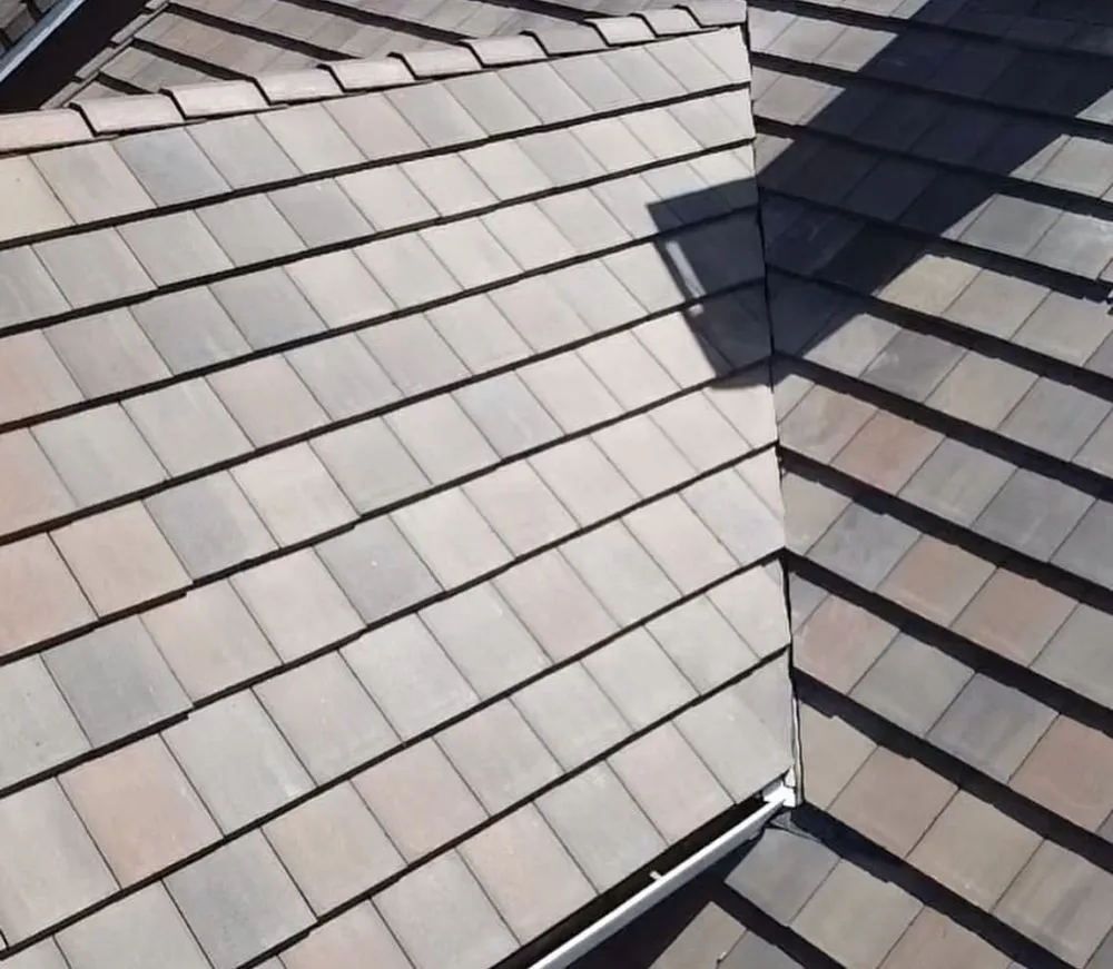 Slide of Exclusively Roofing