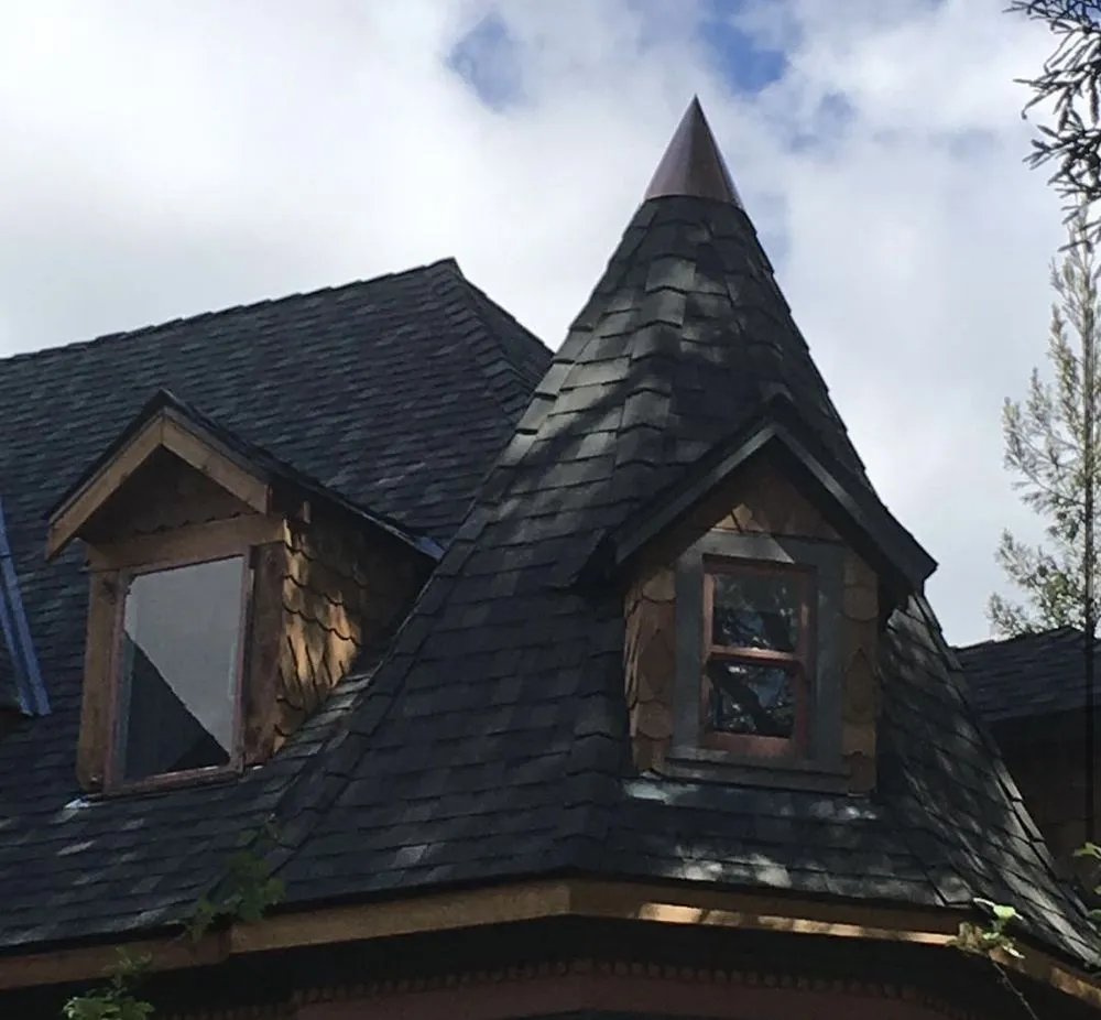 Slide of Exclusively Roofing