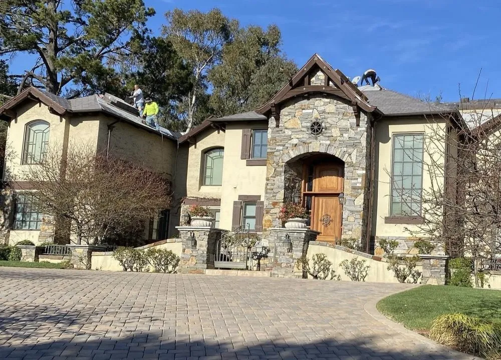 Slide of Exclusively Roofing