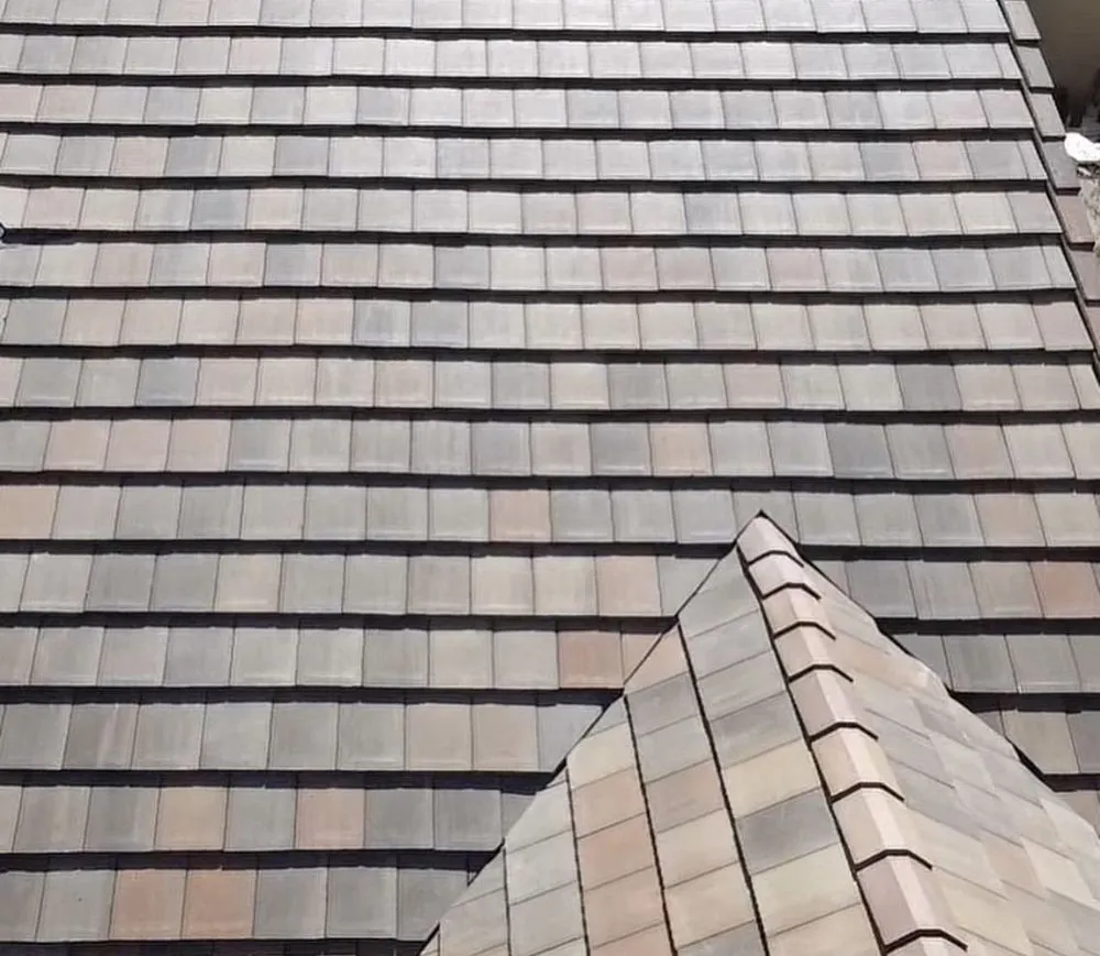 Slide of Exclusively Roofing