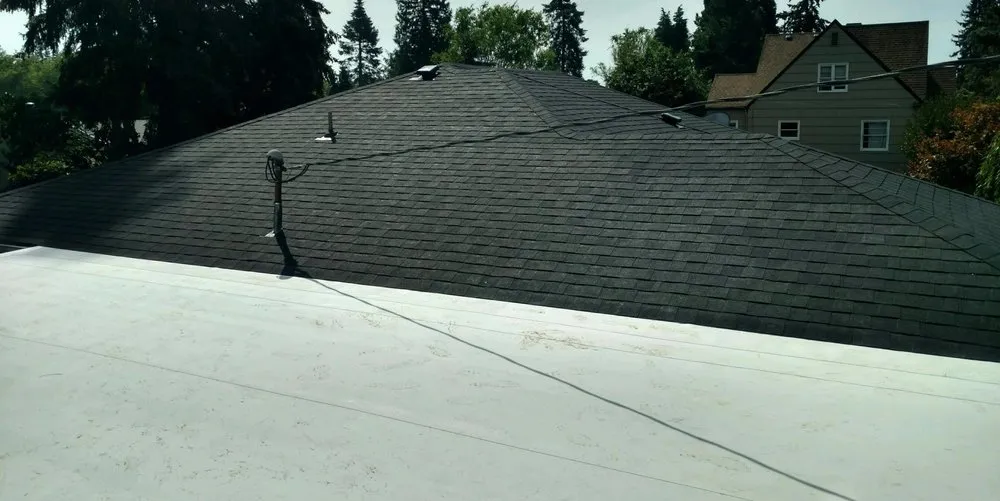 Slide of Executive Roof Services