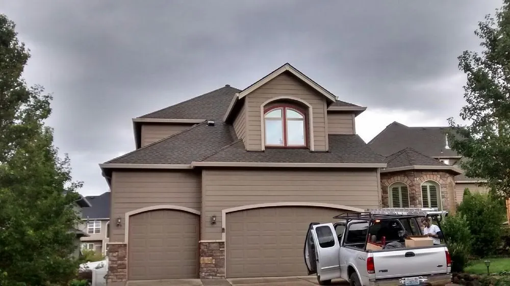 Slide of Executive Roof Services