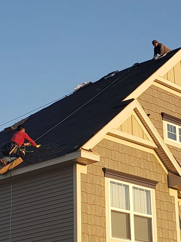 Professional flat roof repair for residential properties in Marine on St. Croix, MN by Experienced Builders