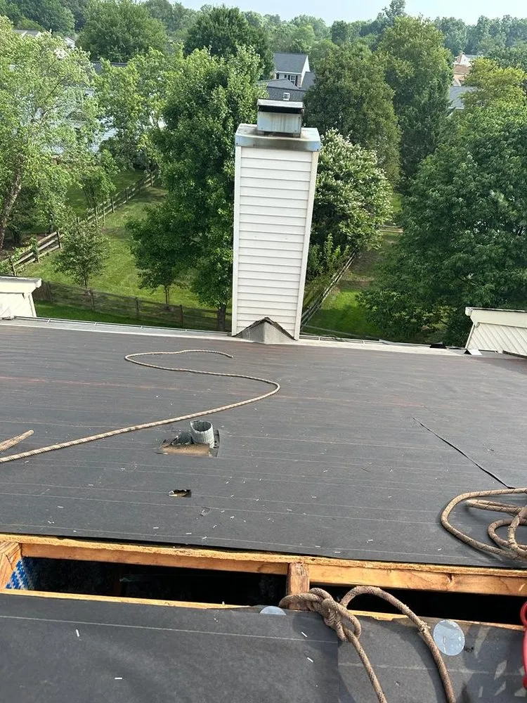 Slide of Expert Pro Roofing