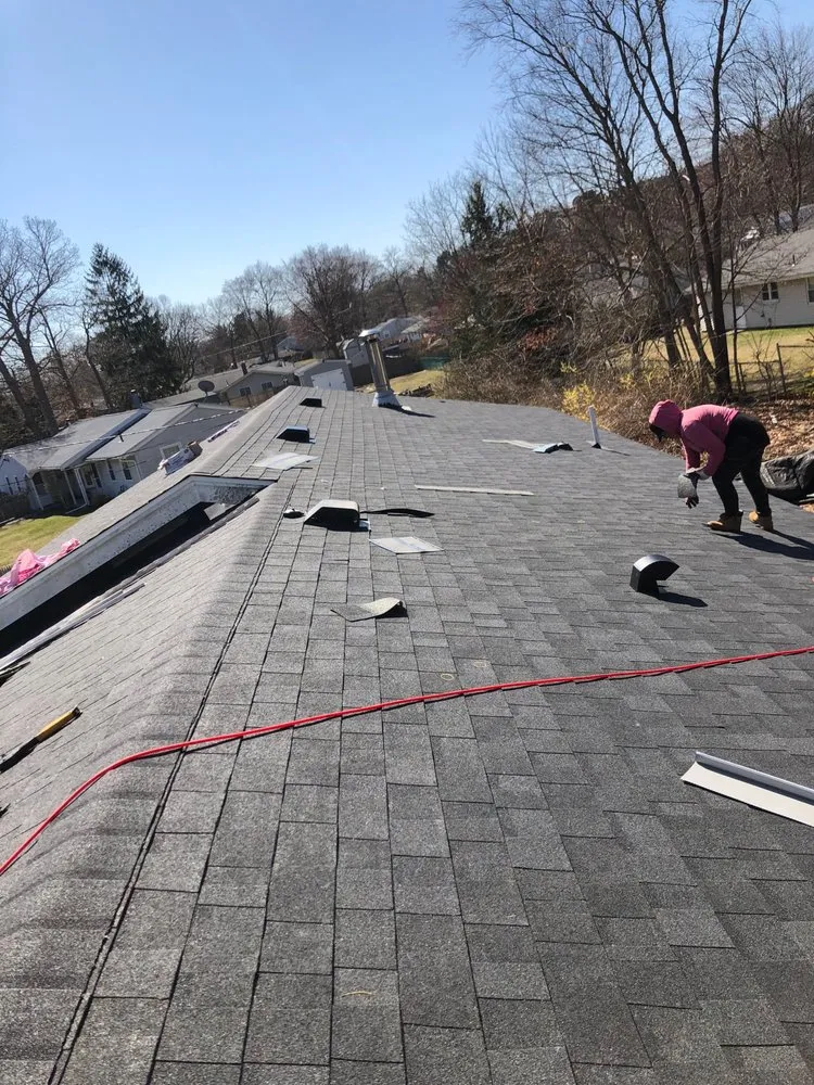 Slide of Expert Roofing & Construction