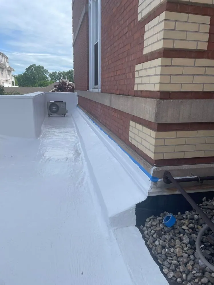 Slide of Expert Roofing & Construction