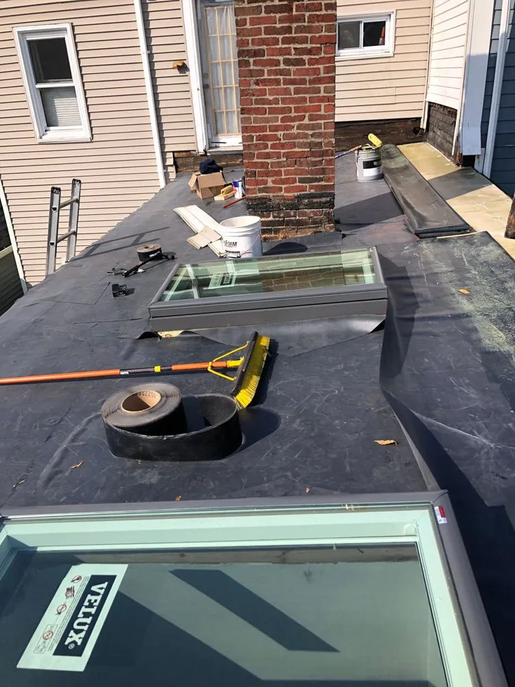 Slide of Expert Roofing & Construction