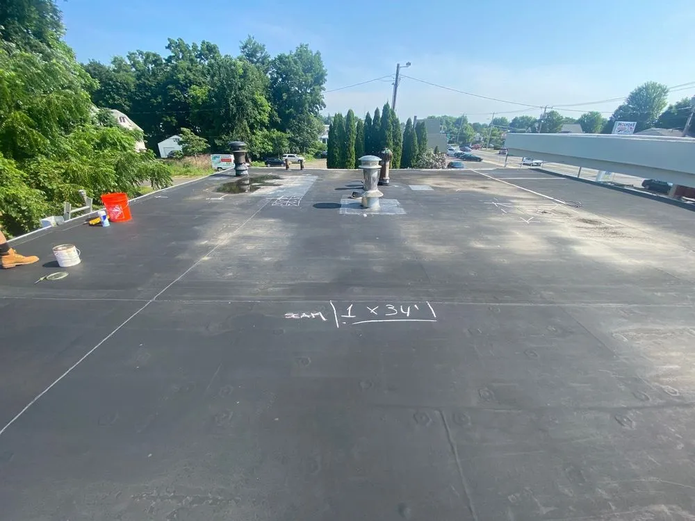 Slide of Expert Roofing & Construction