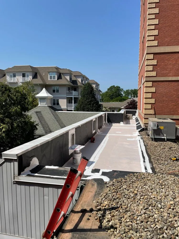 Slide of Expert Roofing & Construction