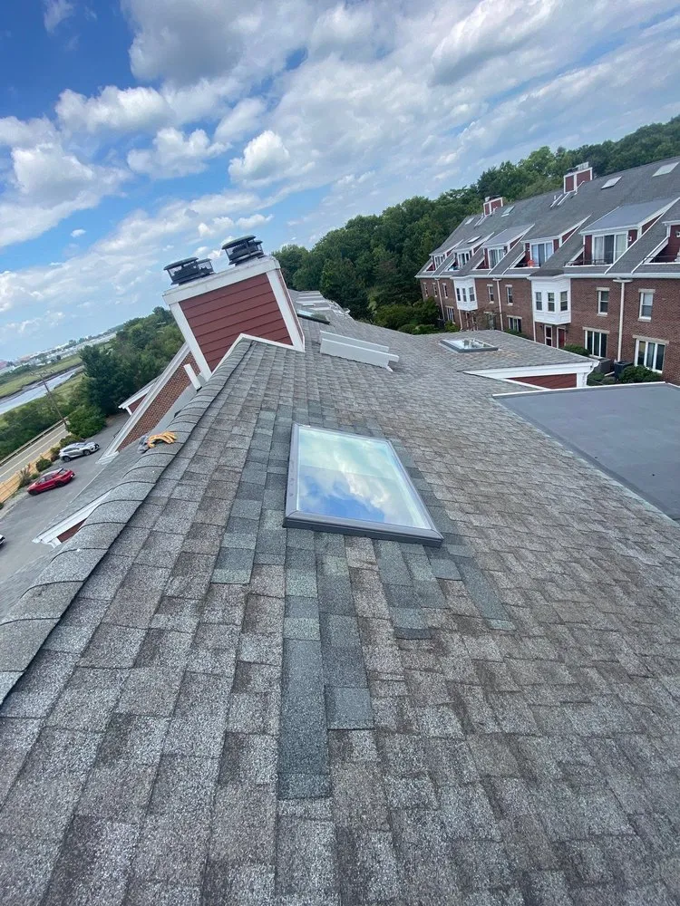 Slide of Expert Roofing & Construction