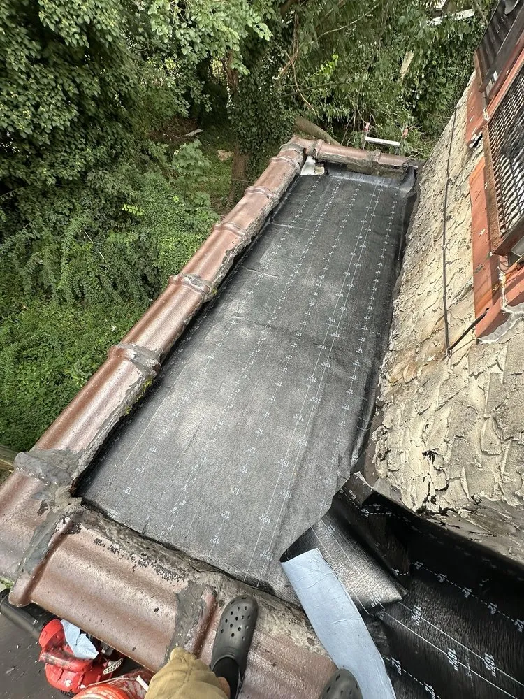 Slide of Expert Roofing & Home Improvements
