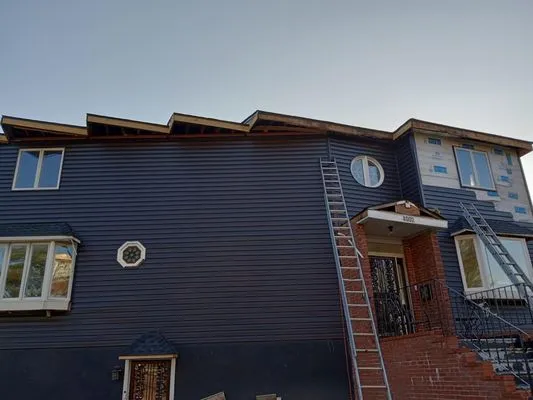 Expert Roofing & Home Improvements Logo