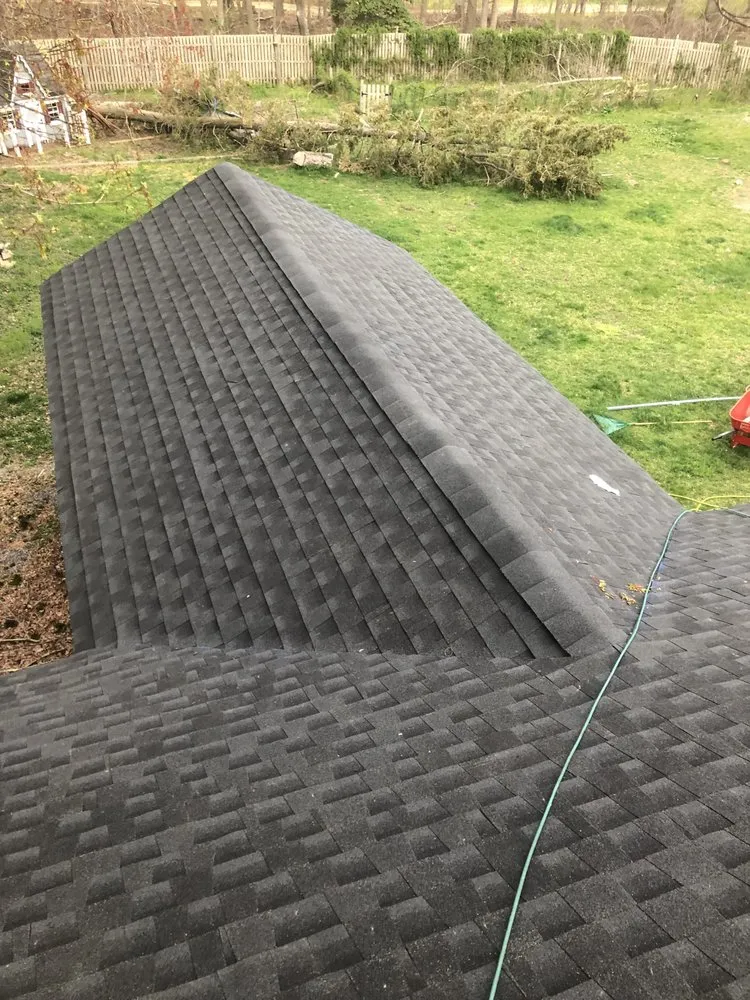 Slide of Expert Roofing