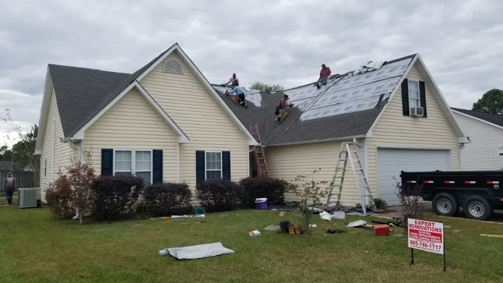 Slide of Expert Roofing