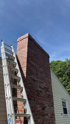 Exquisite Paving and Masonry Logo