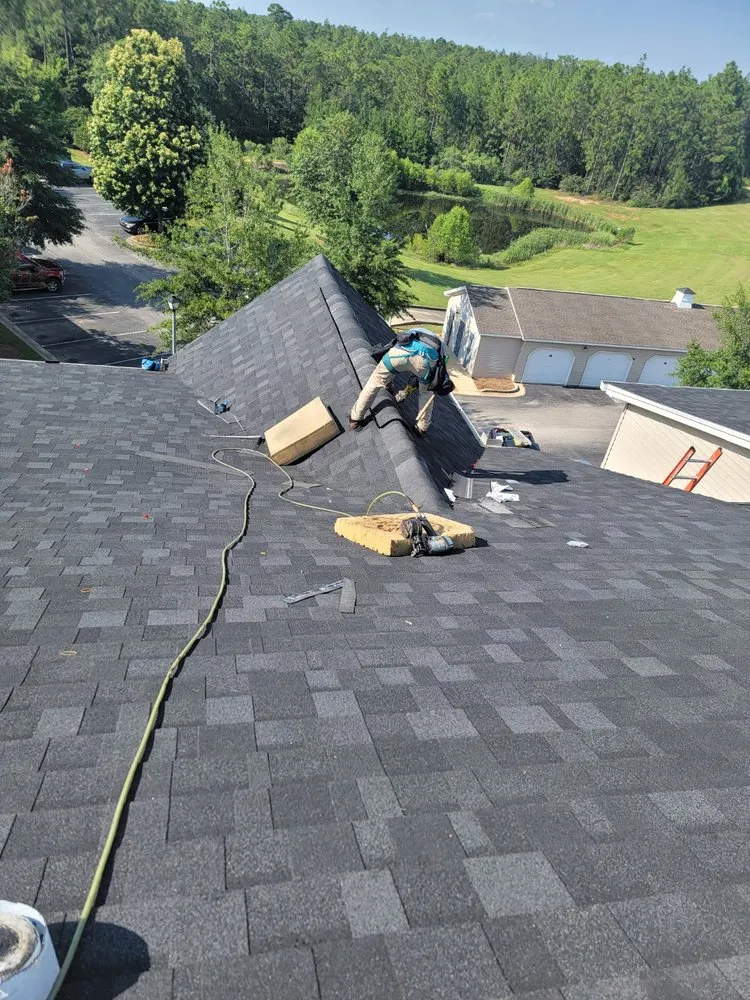 Slide of Exstream Roofing