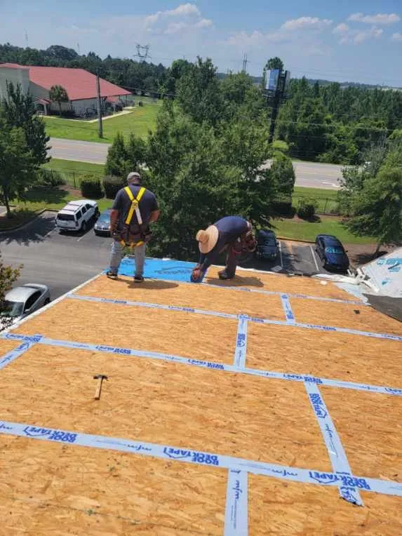 Slide of Exstream Roofing