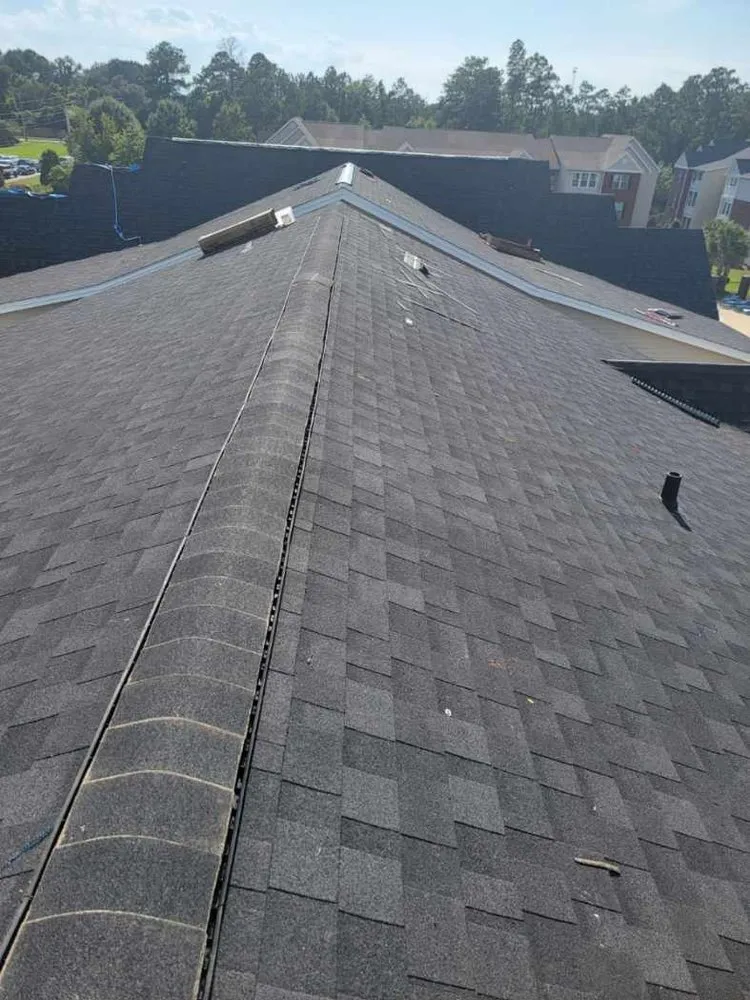 Slide of Exstream Roofing