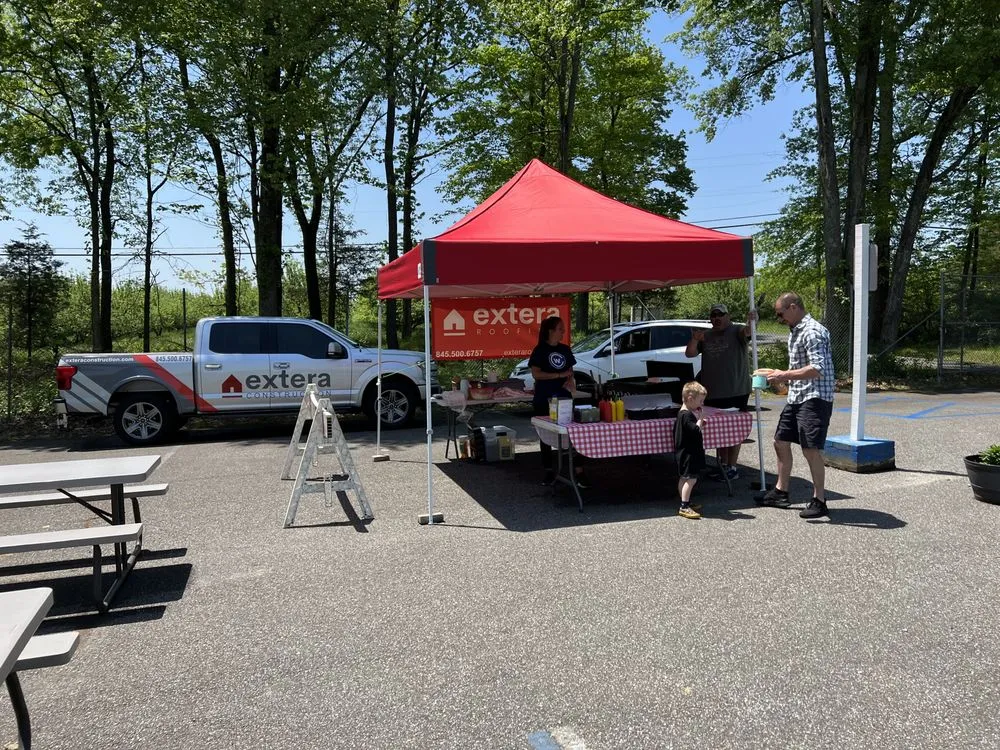 Slide of Extera Roofing