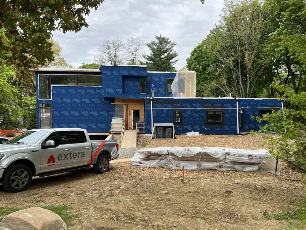 Slide of Extera Roofing