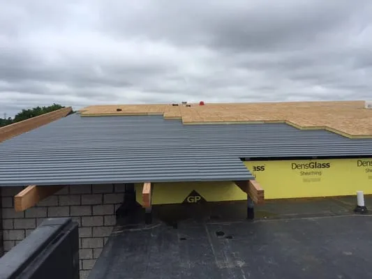 Exterior Building Services Logo