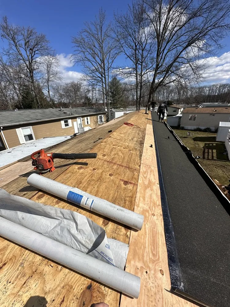 Emergency roof leak repair in North Brunswick Township, NJ by Exterior Pro Construction & Power Washing