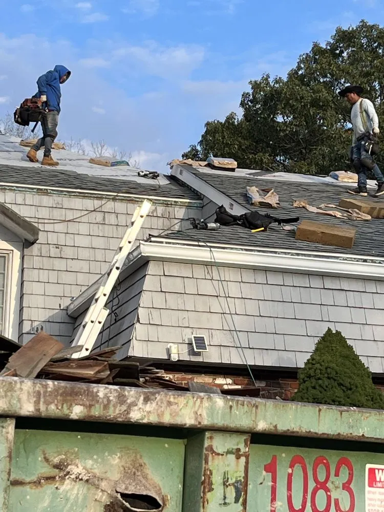 Emergency storm damage roof repair in Charlestown, MA by Exterior Remodelers