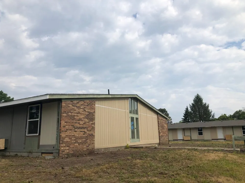 Slide of Exterior Tech Siding & Roofing