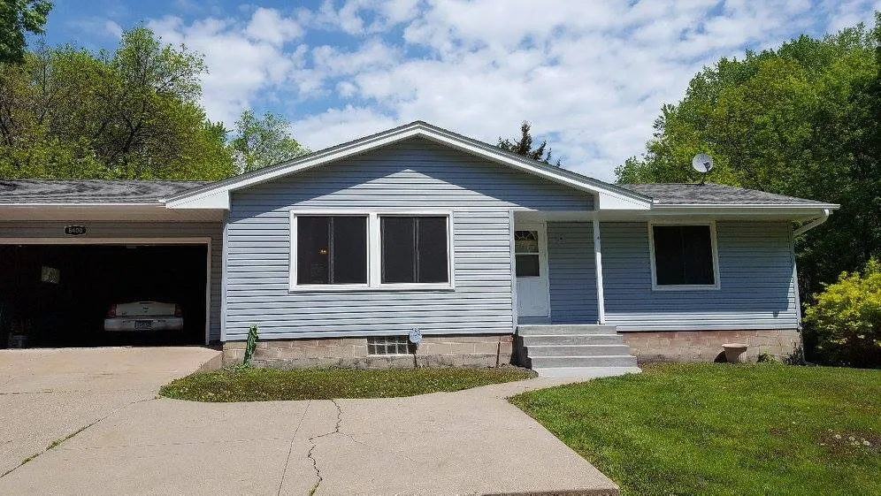 Slide of Exteriors Unlimited