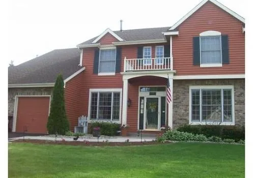 Slide of Exteriors Unlimited