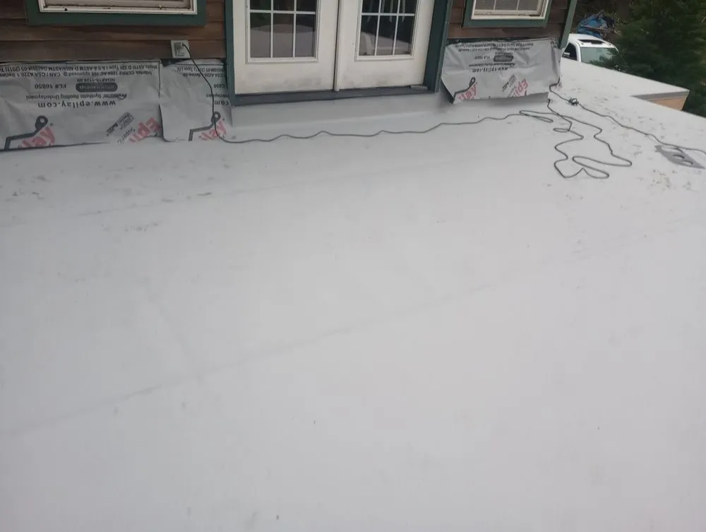 Slide of Exteriors West Roofing