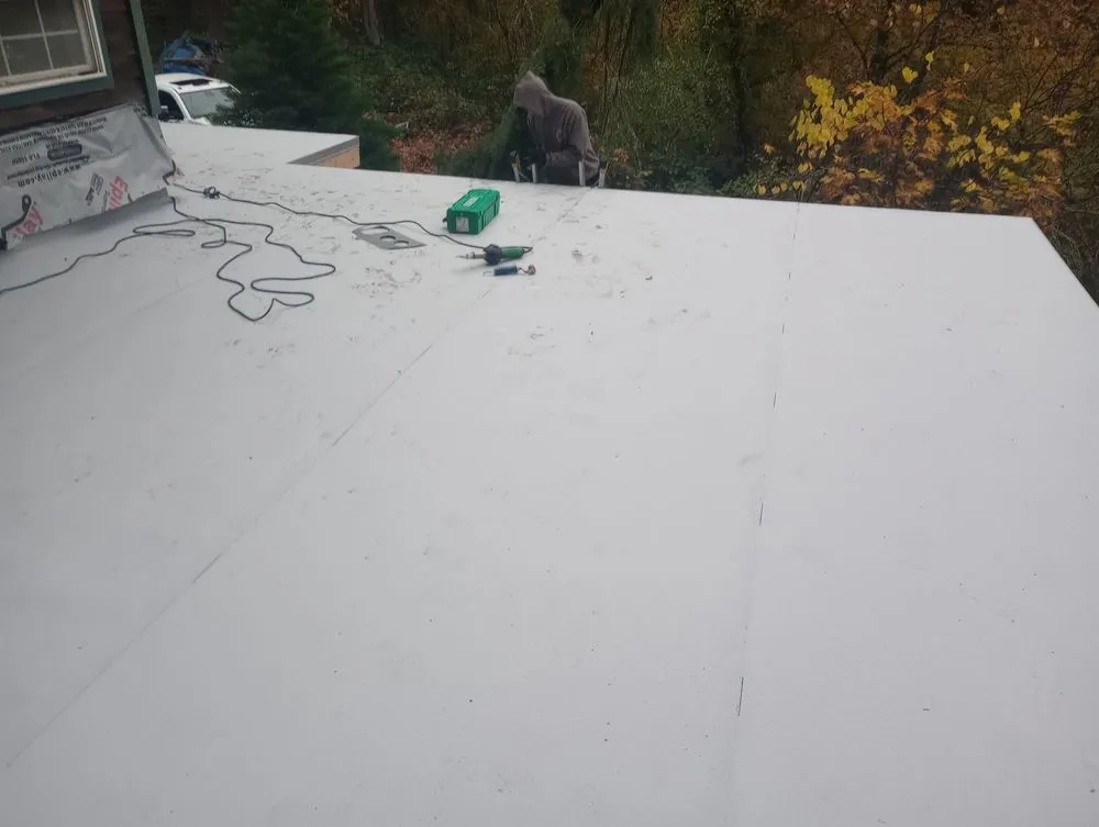 Slide of Exteriors West Roofing