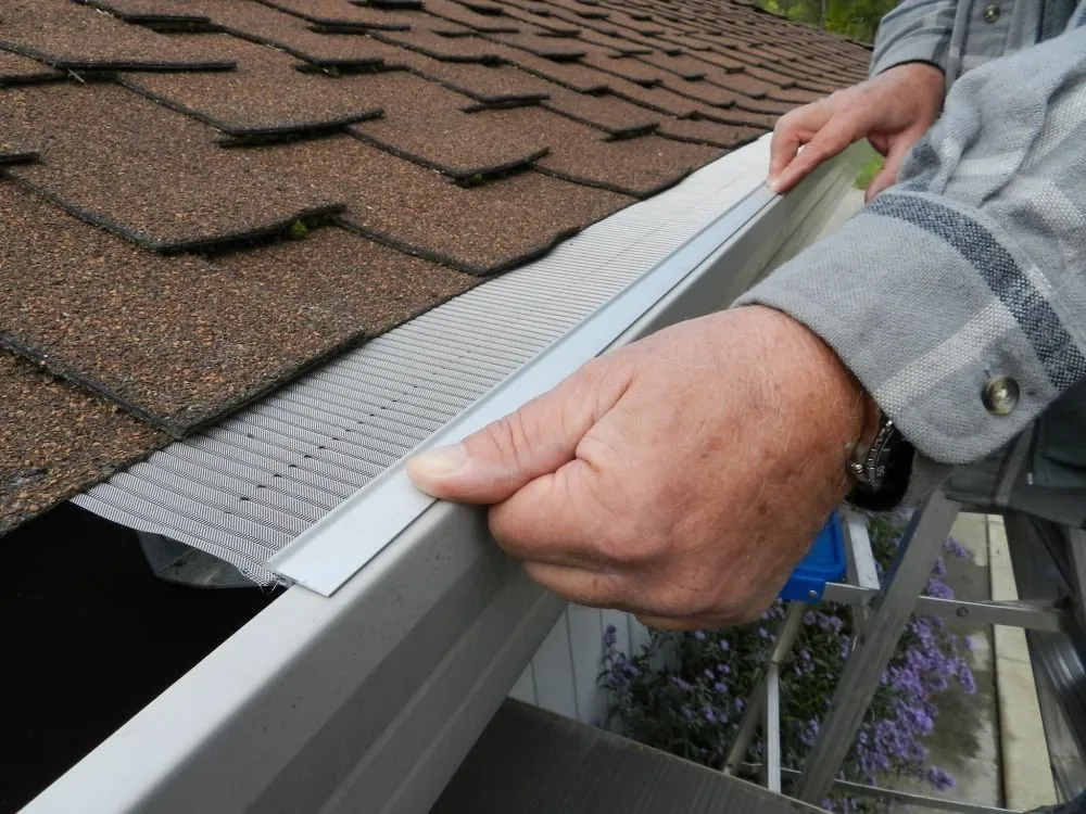 Slide of Extra Mile Roofing