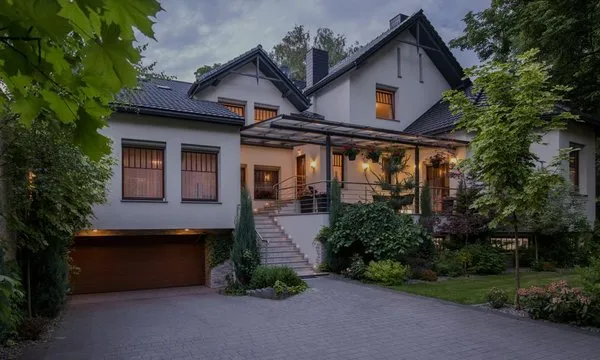 Extra Mile Roofing Logo