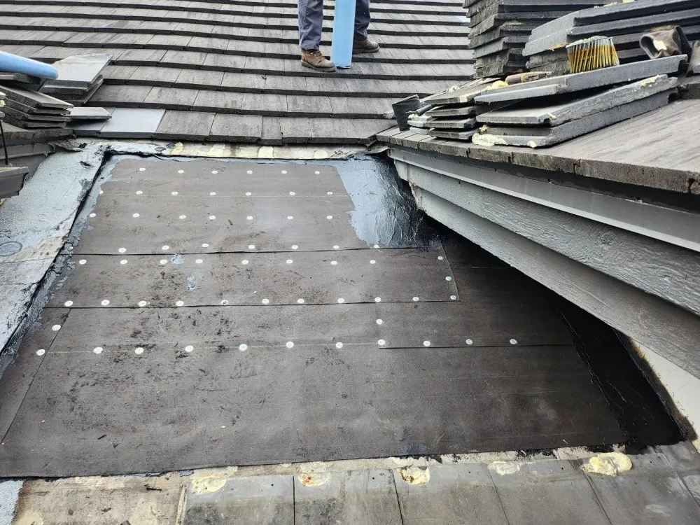 Slide of Extra Myles Roofing