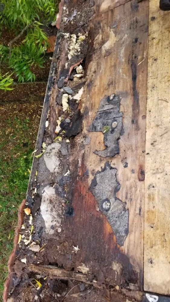 Slide of Extra Myles Roofing