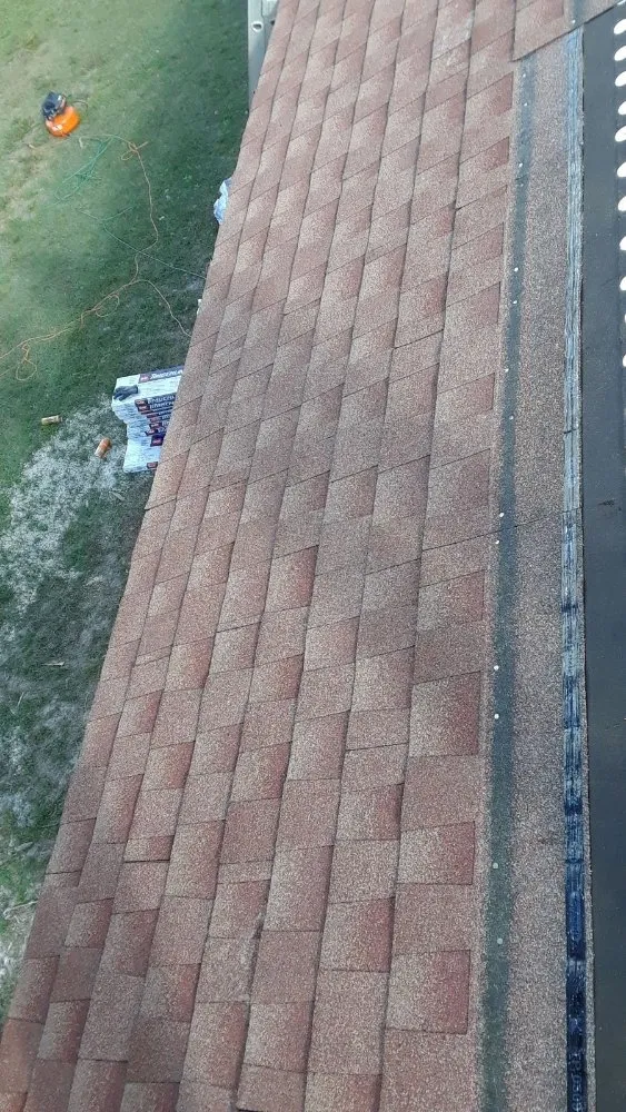 Slide of Extra Myles Roofing