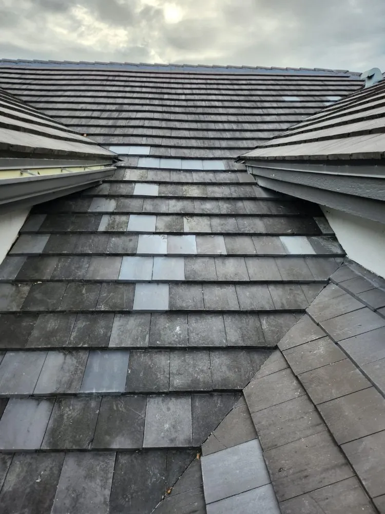 Slide of Extra Myles Roofing