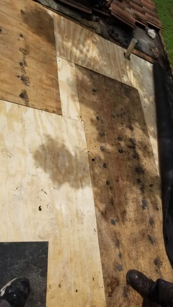 Slide of Extra Myles Roofing