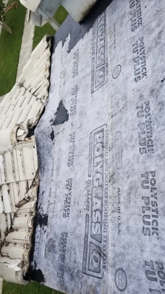 Slide of Extra Myles Roofing