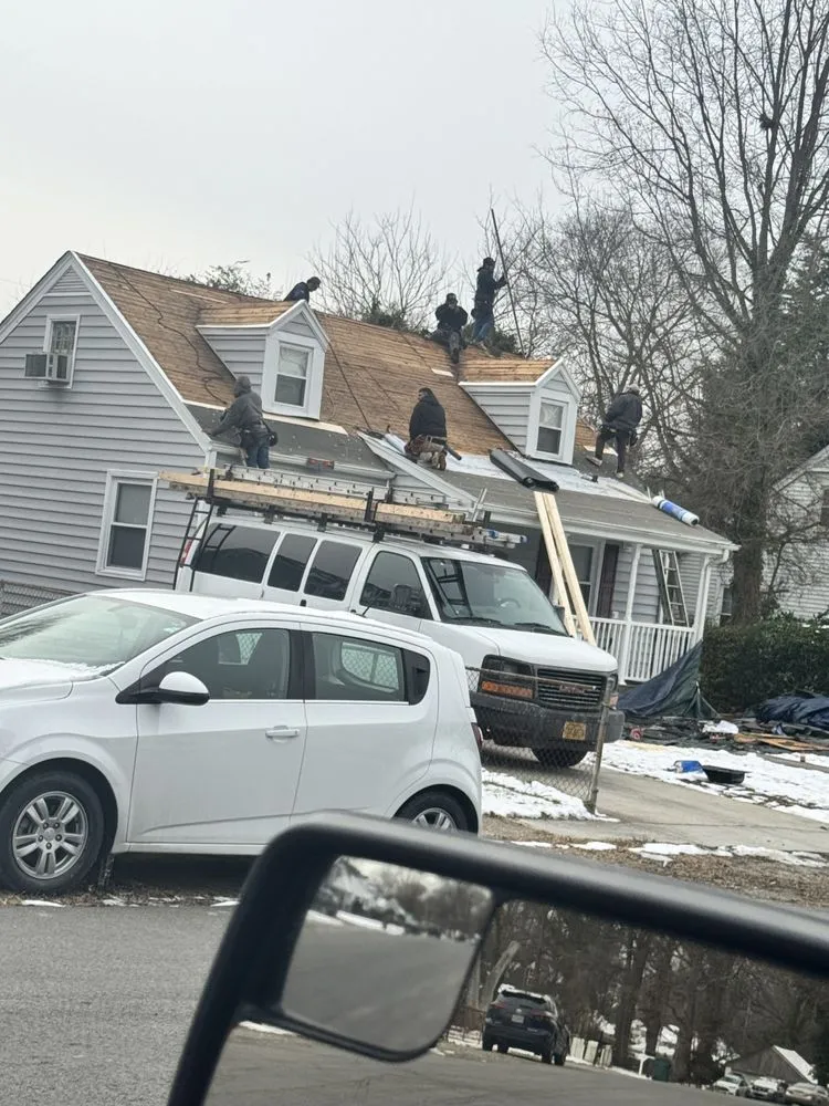 Slide of Extreme Weather Roofing Experts