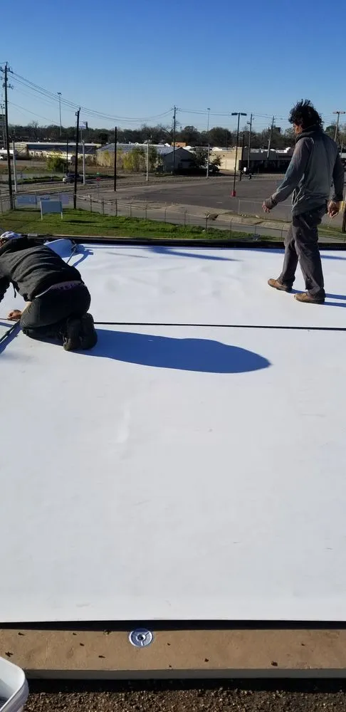 Slide of EZ Roof and Construction