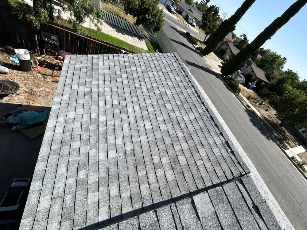 Slide of EZ Roof Repairs