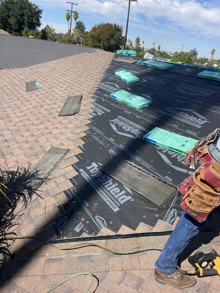 Slide of EZ Roof Repairs